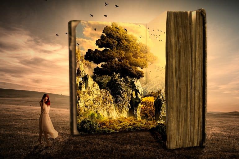 Photo of woman in front of book by Christine Engelhardt for Pixabay
